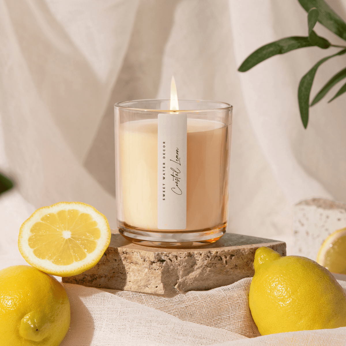 Sweet Water Decor Coastal Lemon Soy Candle - Tinted Glass Jar - 12 oz