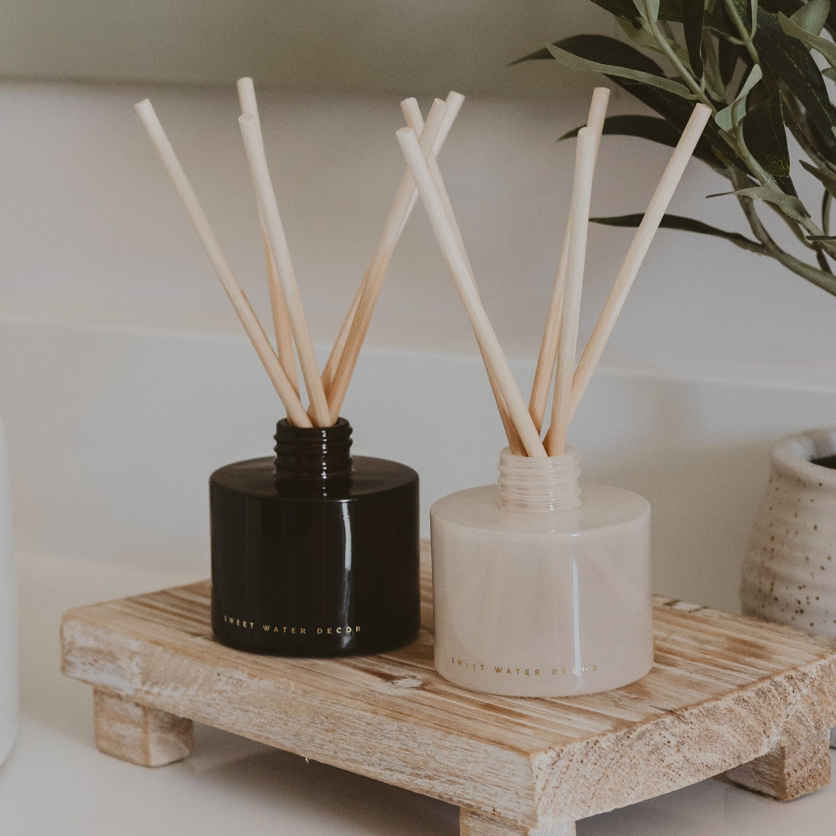 Sweet Water Decor Cashmere and Vanilla White Translucent Tinted Glass Jar Reed Diffuser