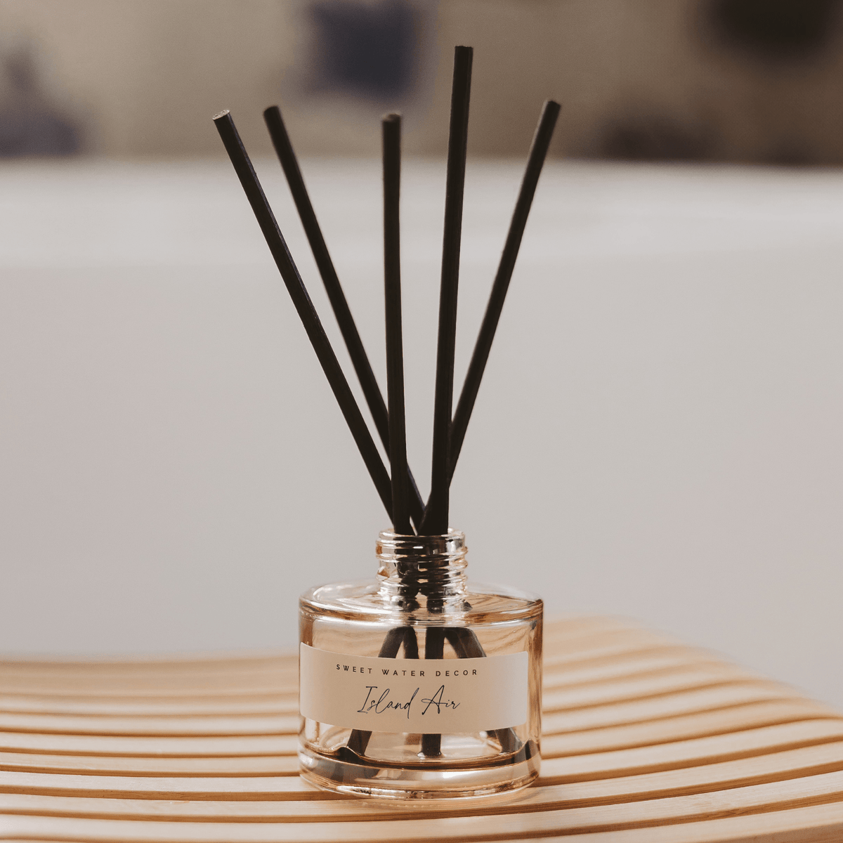 Sweet Water Decor Island Air Tinted Glass Jar Reed Diffuser