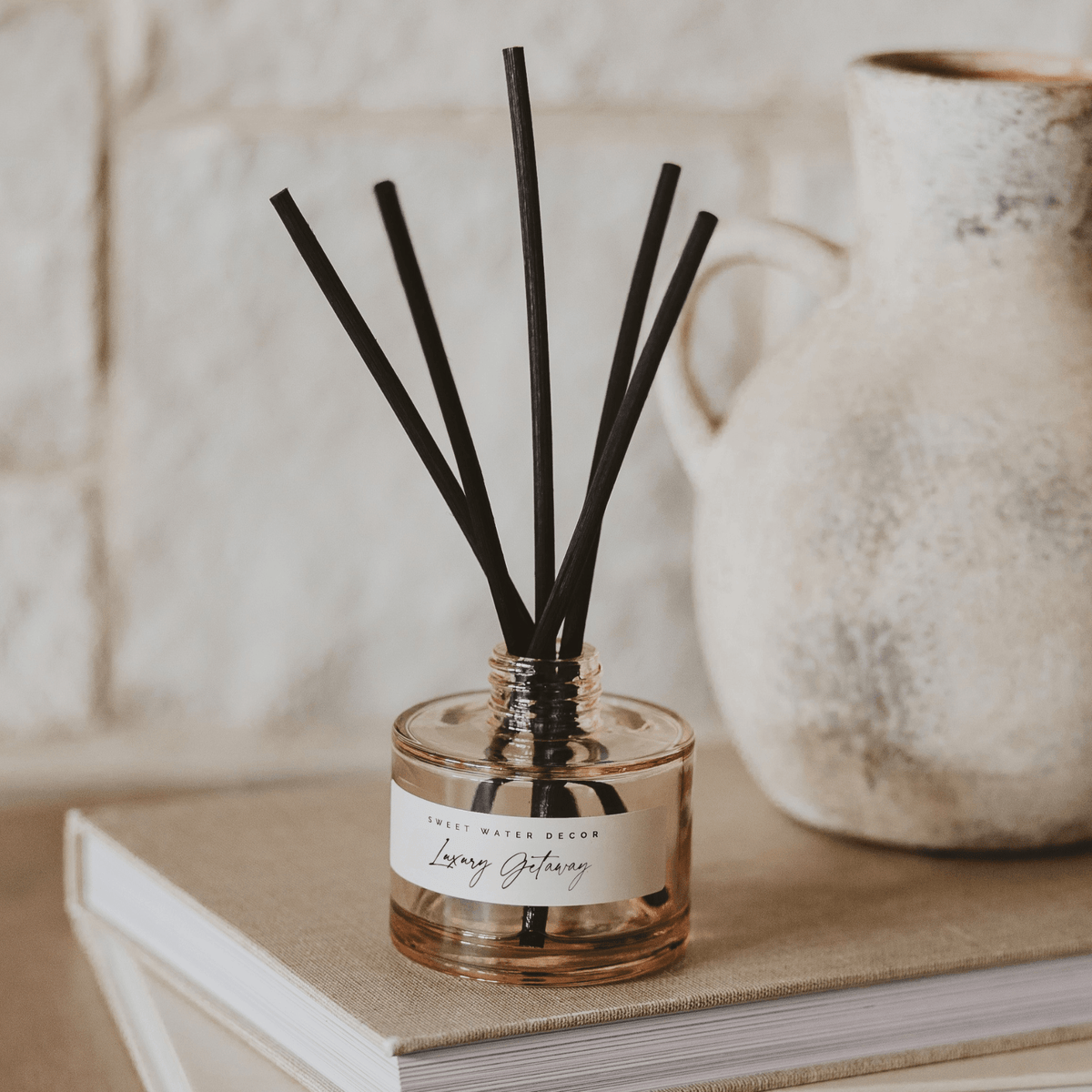 Sweet Water Decor Luxury Getaway Tinted Glass Jar Reed Diffuser